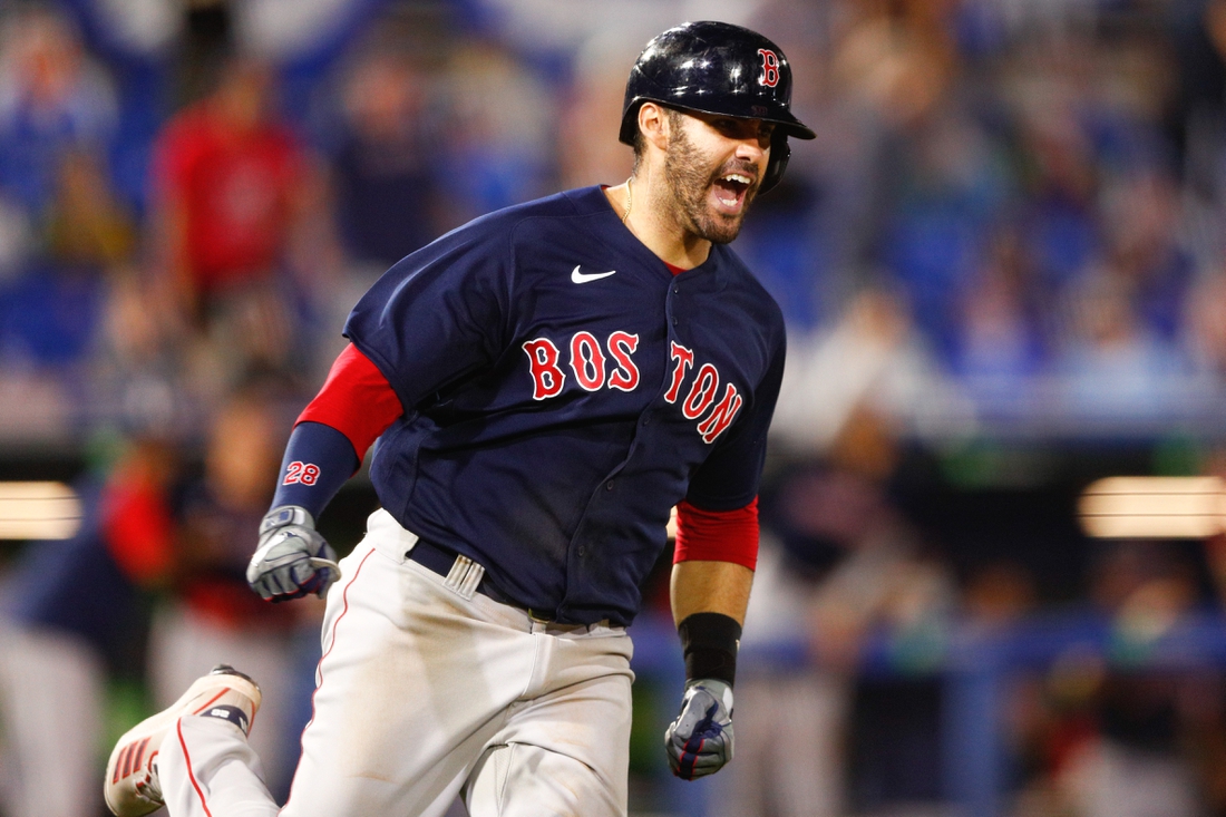 May 20, 2021; Dunedin, Florida, CAN; Boston Red Sox designated hitter J.D. Martinez (28) reacts after hitting a two-run home run during the ninth inning against the Toronto Blue Jays at TD Ballpark. Mandatory Credit: Nathan Ray Seebeck-USA TODAY Sports