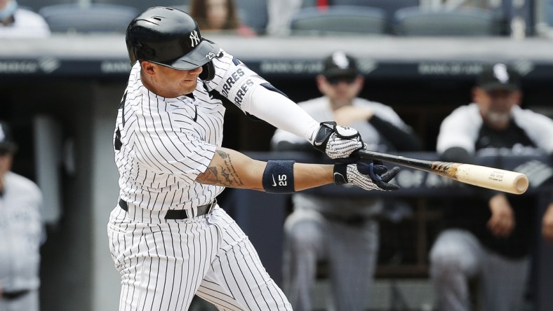 May 22, 2021; Bronx, New York, USA; New York Yankees shortstop Gleyber Torres (25) hits a two run single against the Chicago White Sox during the fifth inning at Yankee Stadium. Mandatory Credit: Andy Marlin-USA TODAY Sports