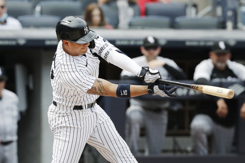 May 22, 2021; Bronx, New York, USA; New York Yankees shortstop Gleyber Torres (25) hits a two run single against the Chicago White Sox during the fifth inning at Yankee Stadium. Mandatory Credit: Andy Marlin-USA TODAY Sports