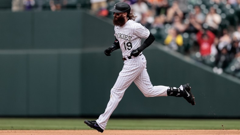 May 22, 2021; Denver, Colorado, USA; Colorado Rockies right fielder Charlie Blackmon (19) rounds the bases on a two run home run in the sixth inning against the Arizona Diamondbacks at Coors Field. Mandatory Credit: Isaiah J. Downing-USA TODAY Sports