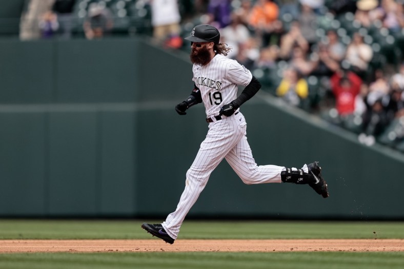 May 22, 2021; Denver, Colorado, USA; Colorado Rockies right fielder Charlie Blackmon (19) rounds the bases on a two run home run in the sixth inning against the Arizona Diamondbacks at Coors Field. Mandatory Credit: Isaiah J. Downing-USA TODAY Sports