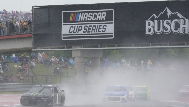 May 23, 2021; Austin, Texas, USA; Kurt Busch (1) drives with poor visibility around turn three in the EchoPark Texas Grand Prix at Circuit of the Americas. Mandatory Credit: Scott Wachter-USA TODAY Sports