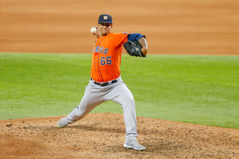 May 23, 2021; Arlington, Texas, USA; Houston Astros relief pitcher Bryan Abreu (66) throws during the seventh inning against the Texas Rangers at Globe Life Field. Mandatory Credit: Andrew Dieb-USA TODAY Sports