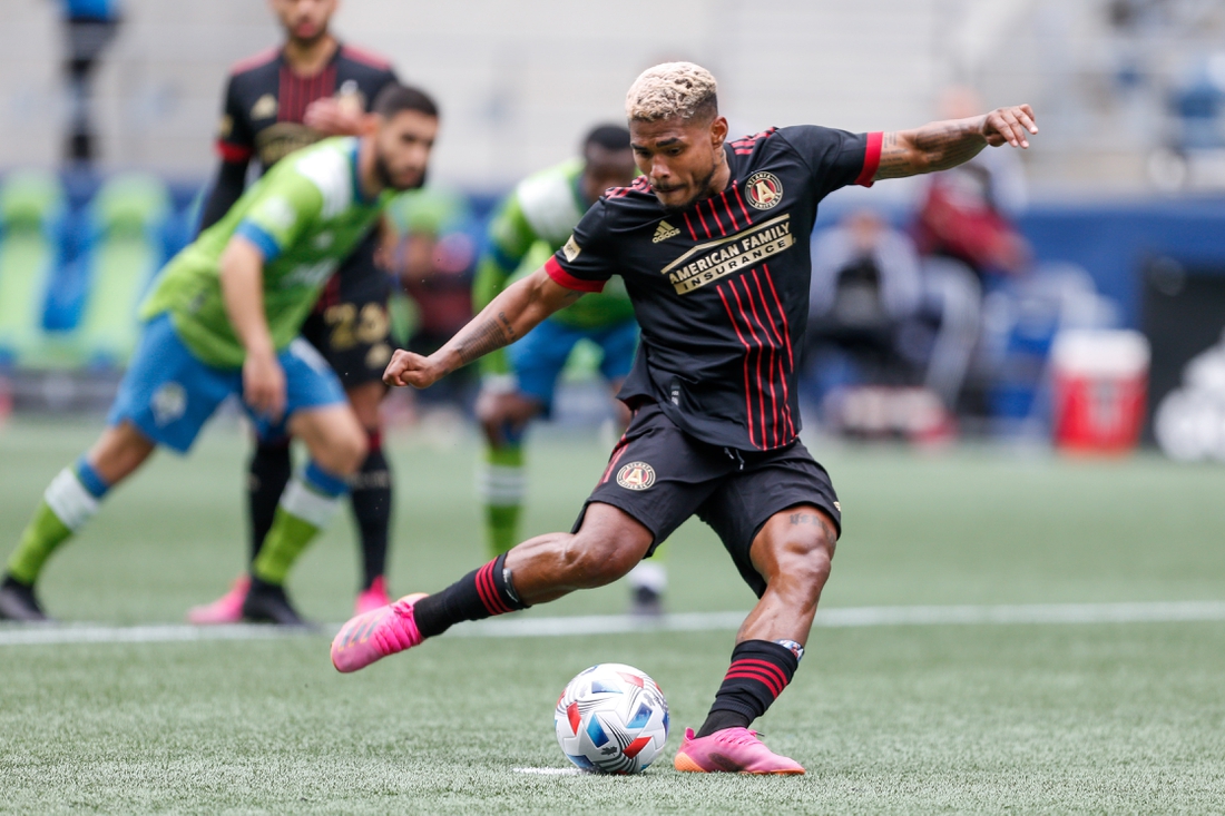 May 23, 2021; Seattle, Washington, USA; Atlanta United FC forward Josef Martinez (7) scores the tying goal on a penalty kick against the Seattle Sounders FC during the second half at Lumen Field. Mandatory Credit: Jennifer Buchanan-USA TODAY Sports