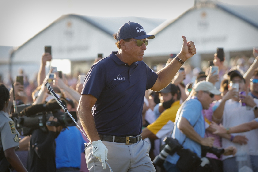 May 23, 2021; Kiawah Island, South Carolina, USA; Phil Mickelson gives a thumbs up to the fans on the 18th green during the final round of the PGA Championship golf tournament. Mandatory Credit: Geoff Burke-USA TODAY Sports