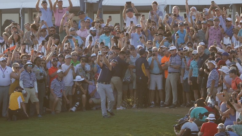 May 23, 2021; Kiawah Island, South Carolina, USA; Phil Mickelson hits his approach shot on the eighteenth hole during the final round of the PGA Championship golf tournament. Mandatory Credit: Geoff Burke-USA TODAY Sports