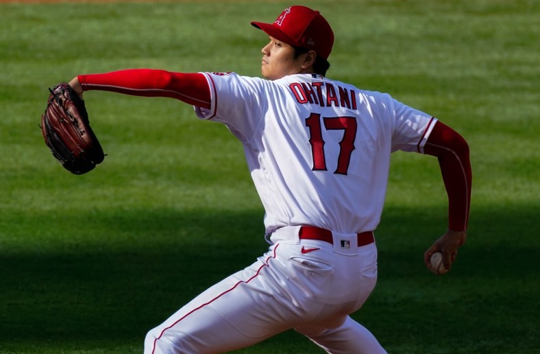 May 19, 2021; Anaheim, California, USA; Los Angeles Angels starting pitcher Shohei Ohtani (17) throws a pitch in the first inning against the Cleveland Indians at Angel Stadium. Mandatory Credit: Robert Hanashiro-USA TODAY Sports