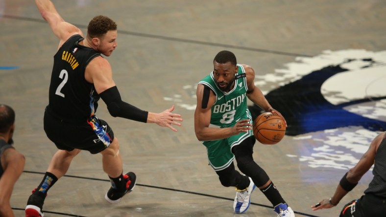 May 25, 2021; Brooklyn, New York, USA; Boston Celtics point guard Kemba Walker (8) drives to the basket against Brooklyn Nets power forward Blake Griffin (2) during the first quarter of game two of the first round of the 2021 NBA Playoffs at Barclays Center. Mandatory Credit: Brad Penner-USA TODAY Sports