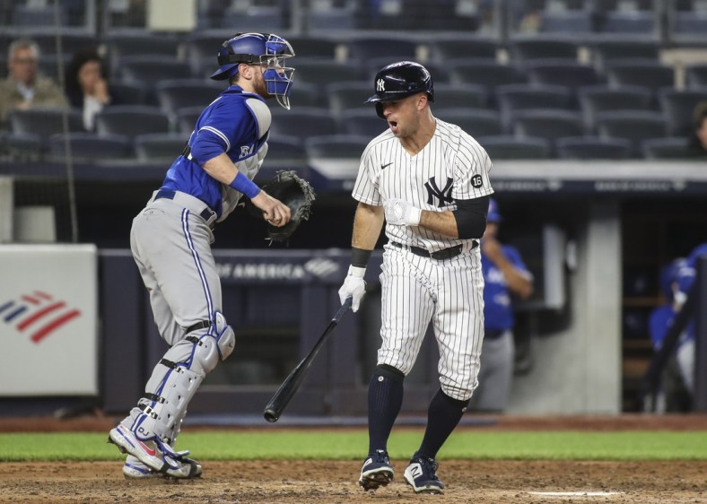 May 25, 2021; Bronx, New York, USA;  New York Yankees center fielder Brett Gardner (11) reacts after striking out to end the fifth inning against the Toronto Blue Jays at Yankee Stadium. Mandatory Credit: Wendell Cruz-USA TODAY Sports