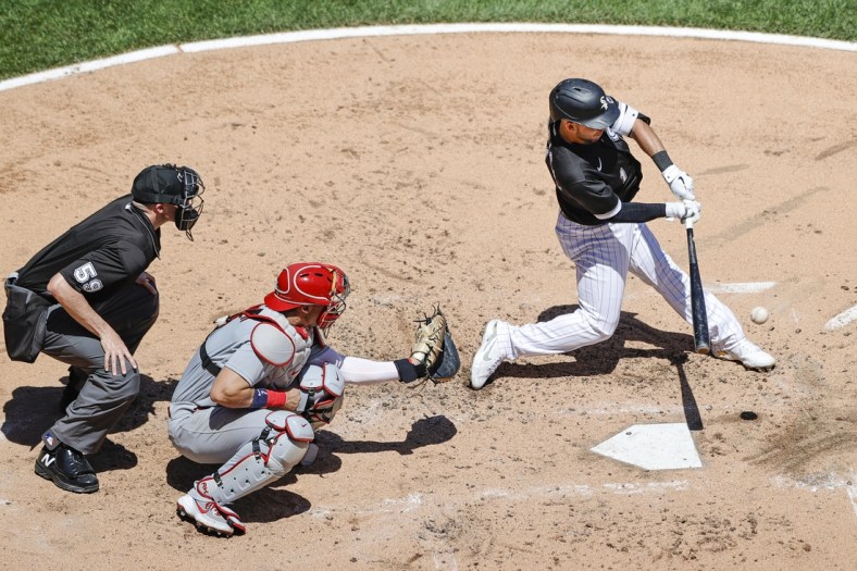 May 26, 2021; Chicago, Illinois, USA; Chicago White Sox second baseman Nick Madrigal (1) singles against the St. Louis Cardinals during the third inning at Guaranteed Rate Field. Mandatory Credit: Kamil Krzaczynski-USA TODAY Sports
