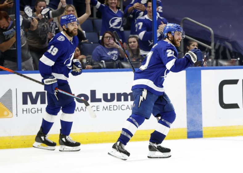 May 26, 2021; Tampa, Florida, USA;Tampa Bay Lightning center Brayden Point (21) celebrates as he scores a goal against the Florida Panthers during the third period during game six of the first round of the 2021 Stanley Cup Playoffs at Amalie Arena. Mandatory Credit: Kim Klement-USA TODAY Sports