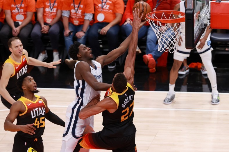 May 26, 2021; Salt Lake City, Utah, USA; Utah Jazz center Rudy Gobert (27) defends against Memphis Grizzlies forward Jaren Jackson Jr. (13) during the second quarter in game two of the first round of the 2021 NBA Playoffs at Vivint Arena. Mandatory Credit: Chris Nicoll-USA TODAY Sports