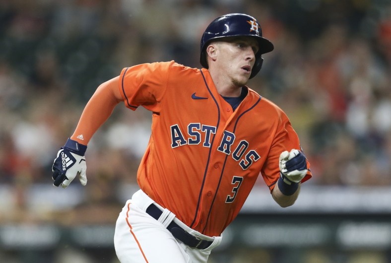 May 28, 2021; Houston, Texas, USA; Houston Astros center fielder Myles Straw (3) watches his double as he runs against the San Diego Padres during the second inning at Minute Maid Park. Mandatory Credit: Thomas Shea-USA TODAY Sports