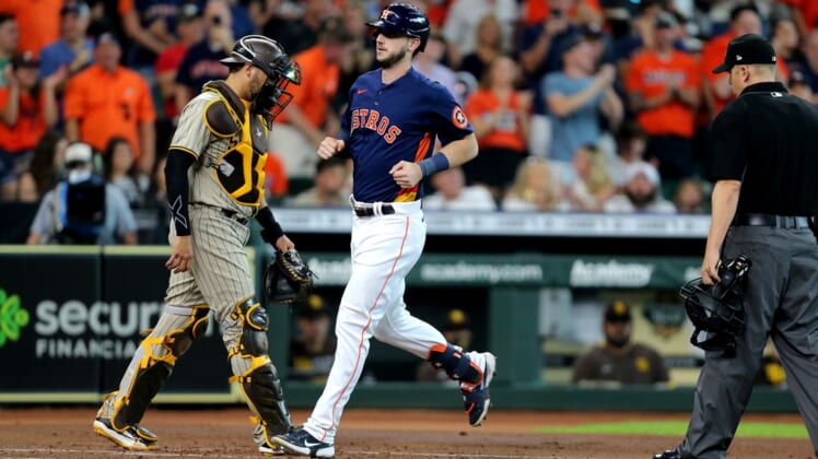 May 30, 2021; Houston, Texas, USA; Houston Astros right fielder Kyle Tucker (30) crosses home plate after hitting a three run home run against the San Diego Padres during the first inning at Minute Maid Park. Mandatory Credit: Erik Williams-USA TODAY Sports