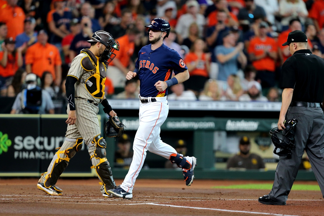 May 30, 2021; Houston, Texas, USA; Houston Astros right fielder Kyle Tucker (30) crosses home plate after hitting a three run home run against the San Diego Padres during the first inning at Minute Maid Park. Mandatory Credit: Erik Williams-USA TODAY Sports