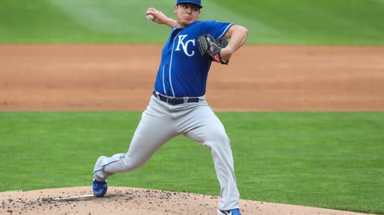 May 30, 2021; Minneapolis, Minnesota, USA; Kansas City Royals starting pitcher Brad Keller (56) delivers a pitch against the Minnesota Twins in the first inning at Target Field. Mandatory Credit: David Berding-USA TODAY Sports