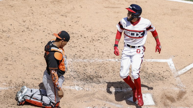 May 30, 2021; Chicago, Illinois, USA; Chicago White Sox center fielder Billy Hamilton (0) smiles as he crosses home plate after hitting a solo home run against the Baltimore Orioles during the third inning at Guaranteed Rate Field. Mandatory Credit: Kamil Krzaczynski-USA TODAY Sports