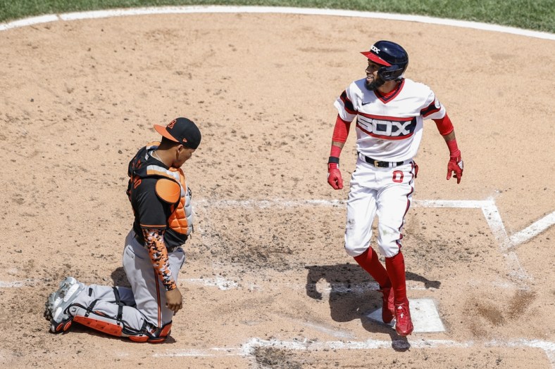 May 30, 2021; Chicago, Illinois, USA; Chicago White Sox center fielder Billy Hamilton (0) smiles as he crosses home plate after hitting a solo home run against the Baltimore Orioles during the third inning at Guaranteed Rate Field. Mandatory Credit: Kamil Krzaczynski-USA TODAY Sports