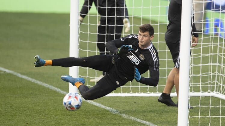 May 30, 2021; Chester, Pennsylvania, USA; Philadelphia Union goalkeeper Matt Freese (1) makes a save during warms up prior to the match against the Portland Timbers at Subaru Park. Mandatory Credit: Mitchell Leff-USA TODAY Sports