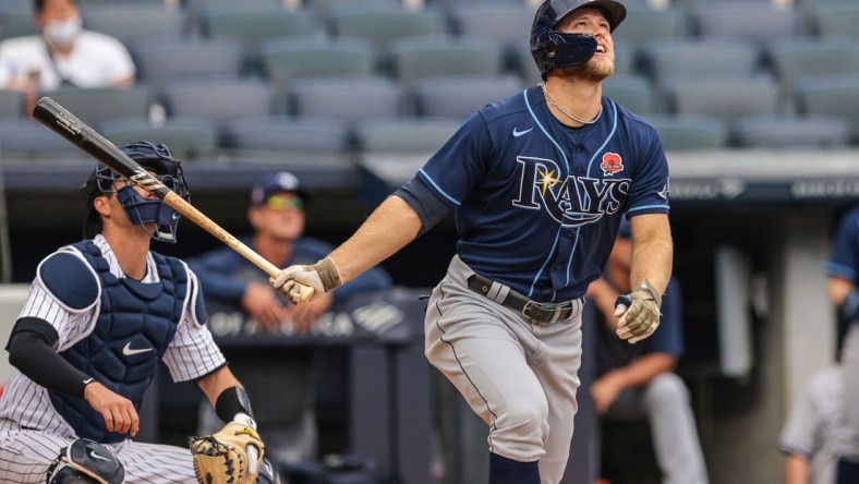 May 31, 2021; Bronx, New York, USA; Tampa Bay Rays designated hitter Austin Meadows (17) hits a home run during the fourth inning against the New York Yankees at Yankee Stadium. Mandatory Credit: Vincent Carchietta-USA TODAY Sports