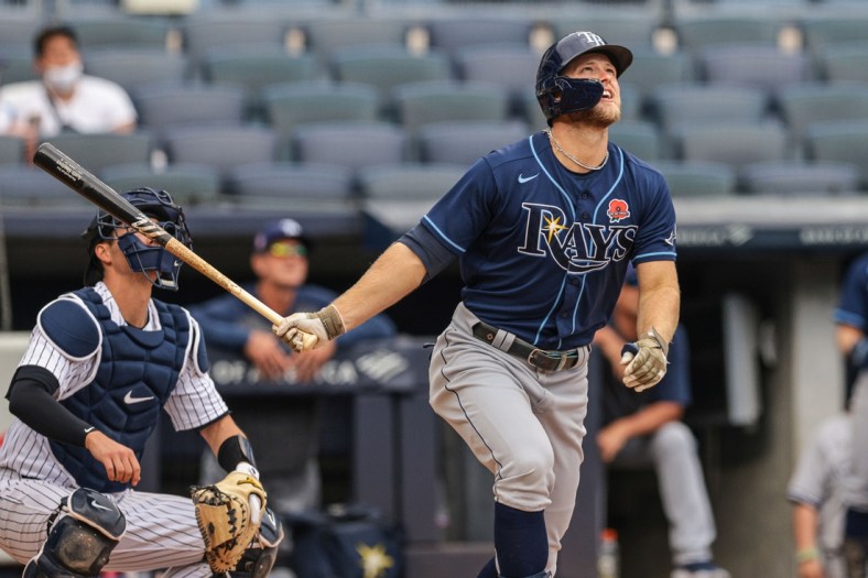 May 31, 2021; Bronx, New York, USA; Tampa Bay Rays designated hitter Austin Meadows (17) hits a home run during the fourth inning against the New York Yankees at Yankee Stadium. Mandatory Credit: Vincent Carchietta-USA TODAY Sports