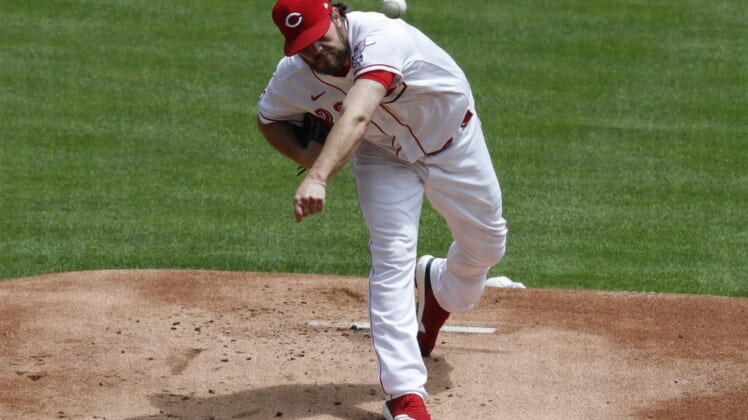 May 31, 2021; Cincinnati, Ohio, USA; Cincinnati Reds Wade Miley throws against the Philadelphia Phillies during the first inning at Great American Ball Park. Mandatory Credit: David Kohl-USA TODAY Sports