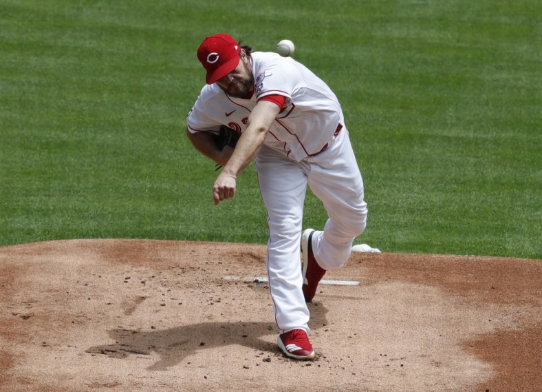 May 31, 2021; Cincinnati, Ohio, USA; Cincinnati Reds Wade Miley throws against the Philadelphia Phillies during the first inning at Great American Ball Park. Mandatory Credit: David Kohl-USA TODAY Sports
