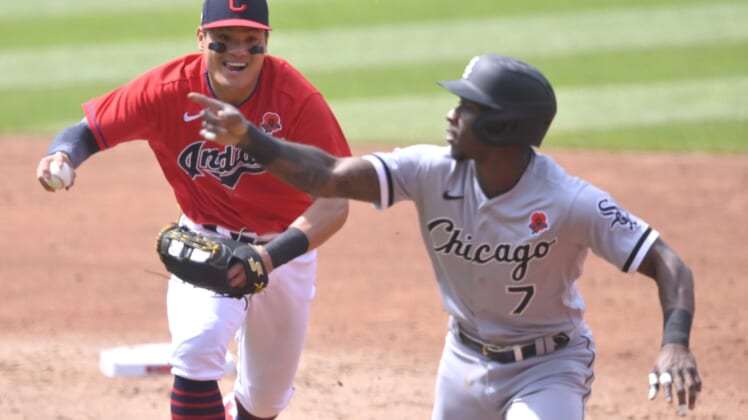 May 31, 2021; Cleveland, Ohio, USA; Chicago White Sox shortstop Tim Anderson (7) reacts as he is chased by Cleveland Indians shortstop Yu Chang (2) during a rundown in the second inning at Progressive Field. Mandatory Credit: David Richard-USA TODAY Sports