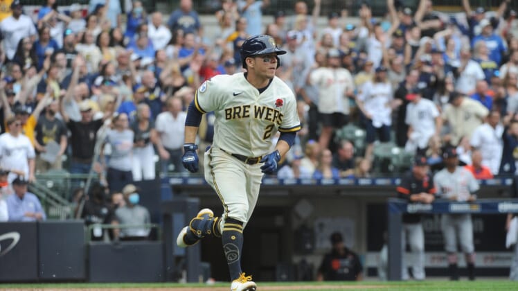 May 31, 2021; Milwaukee, Wisconsin, USA; Milwaukee Brewers third baseman Luis Urias (2) knocks in the winning run in the tenth inning against the Detroit Tigers at American Family Field. Final score Milwaukee Brewers 3, Detroit Tigers 2. Mandatory Credit: Michael McLoone-USA TODAY Sports