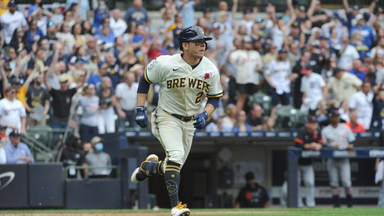 May 31, 2021; Milwaukee, Wisconsin, USA; Milwaukee Brewers third baseman Luis Urias (2) knocks in the winning run in the tenth inning against the Detroit Tigers at American Family Field. Final score Milwaukee Brewers 3, Detroit Tigers 2. Mandatory Credit: Michael McLoone-USA TODAY Sports