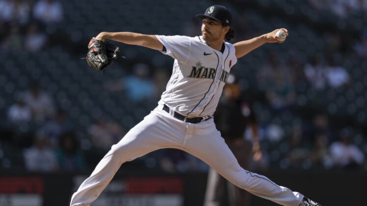 May 31, 2021; Seattle, Washington, USA;  Seattle Mariners reliever Daniel Zamora (62) delivers a pitch during the tenth inning of a game against the Oakland Athletics at T-Mobile Park. The Mariners won 6-5 in 10 innings. Mandatory Credit: Stephen Brashear-USA TODAY Sports
