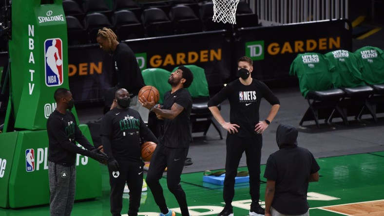 WATCH: Celtics fans welcome back Kyrie Irving with boos