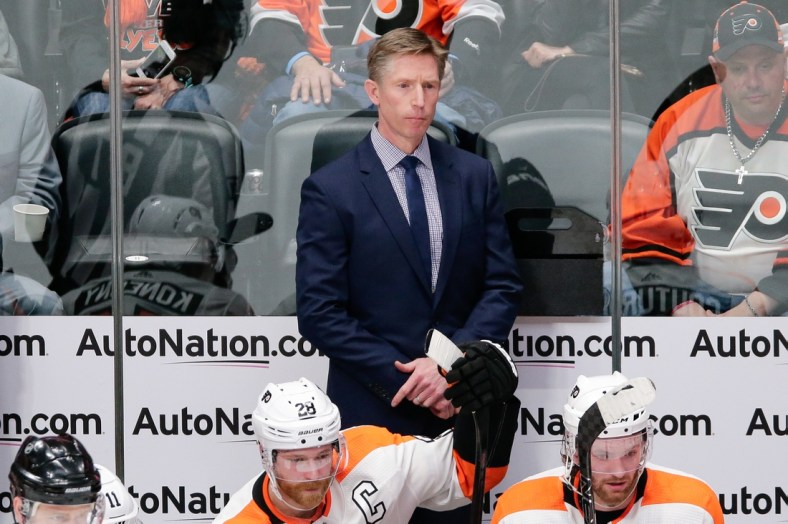 Mar 28, 2018; Denver, CO, USA; Philadelphia Flyers head coach Dave Hakstol looks on in the second period against the Colorado Avalanche at the Pepsi Center. Mandatory Credit: Isaiah J. Downing-USA TODAY Sports