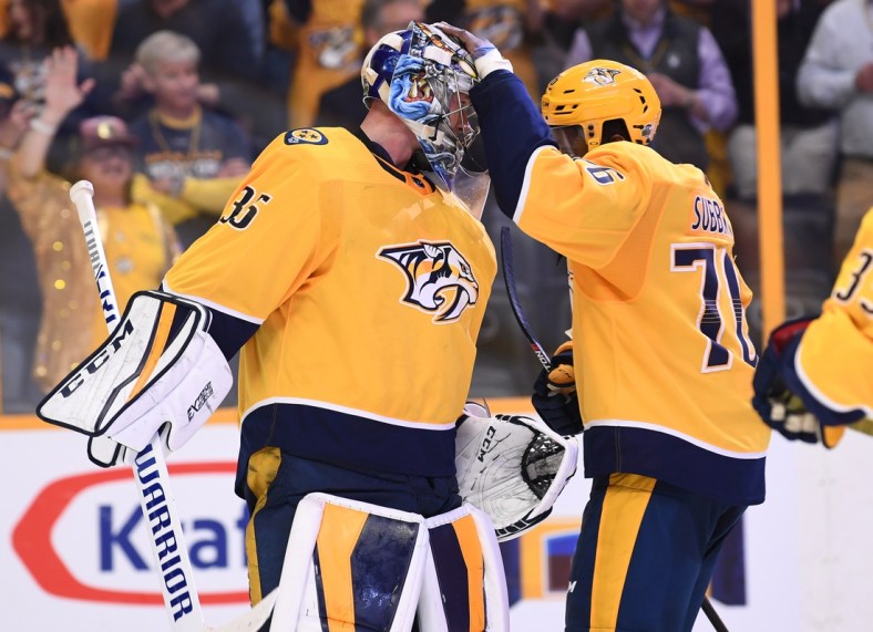Apr 12, 2018; Nashville, TN, USA; Nashville Predators goalie Pekka Rinne (35) is congratulated by Nashville Predators defenseman P.K. Subban (76) after a win against the Colorado Avalanche in game one of the first round of the 2018 Stanley Cup Playoffs at Bridgestone Arena. Mandatory Credit: Christopher Hanewinckel-USA TODAY Sports