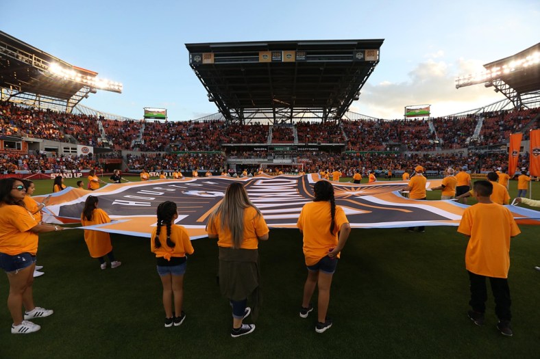 May 5, 2018; Houston, TX, USA; A giant Dynamo logo is laid on the pitch before the  Los Angeles Galaxy play the Houston Dynamo in the first half at BBVA Compass Stadium. Mandatory Credit: Thomas B. Shea-USA TODAY Sports