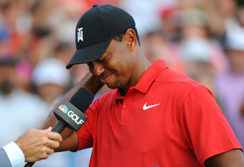 Sep 23, 2018; Atlanta, GA, USA;  Tiger Woods answers questions during a post round interview following the final round of the Tour Championship golf tournament at East Lake Golf Club. Mandatory Credit: Christopher Hanewinckel-USA TODAY Sports