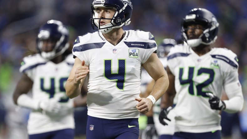 Oct 28, 2018; Detroit, MI, USA; Seattle Seahawks punter Michael Dickson (4) jogs onto the field during the fourth quarter against the Detroit Lions at Ford Field. Mandatory Credit: Raj Mehta-USA TODAY Sports