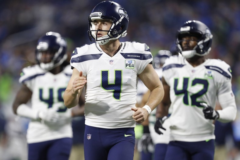 Oct 28, 2018; Detroit, MI, USA; Seattle Seahawks punter Michael Dickson (4) jogs onto the field during the fourth quarter against the Detroit Lions at Ford Field. Mandatory Credit: Raj Mehta-USA TODAY Sports