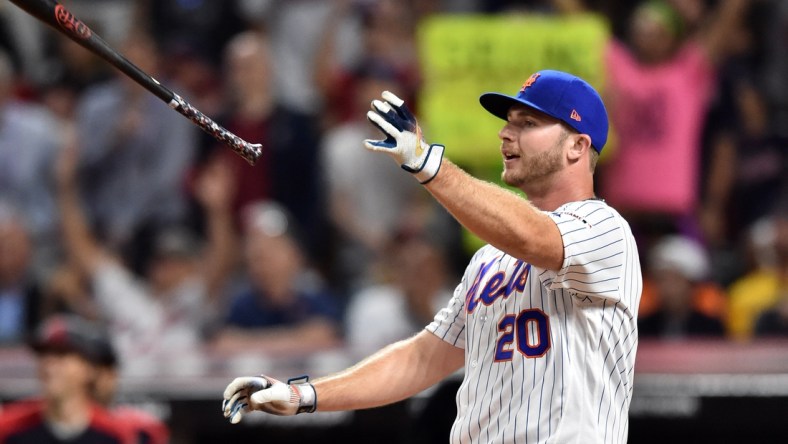 Jul 8, 2019; Cleveland, OH, USA; New York Mets first baseman Pete Alonso (20) celebrates after winning the 2019 MLB Home Run Derby at Progressive Field. Mandatory Credit: Ken Blaze-USA TODAY Sports