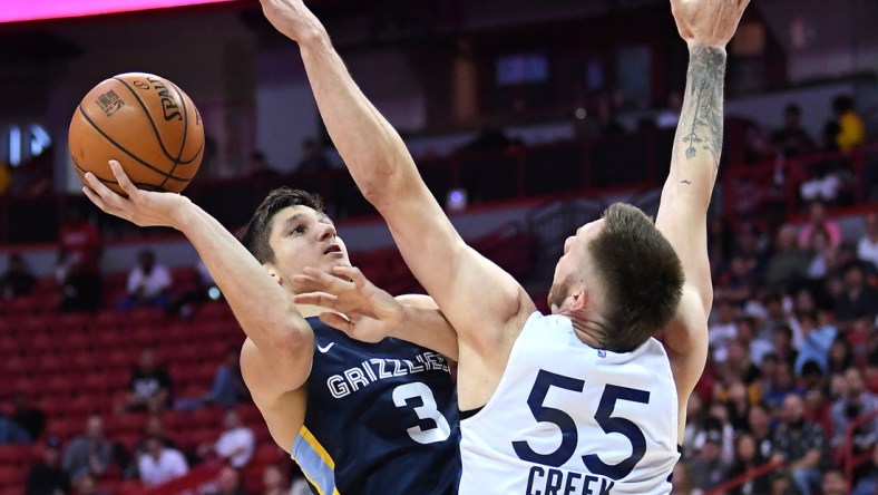 Jul 15, 2019; Las Vegas, NV, USA; Memphis Grizzlies guard Grayson Allen (3) shoots against Minnesota Timberwolves forward Mitch Creek (55) during the first half of the NBA Summer League championship game at Thomas & Mack Center. Mandatory Credit: Stephen R. Sylvanie-USA TODAY Sports