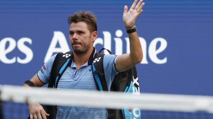Sep 3, 2019; Flushing, NY, USA; Stan Wawrinka of Switzerland waves to the crowd while leaving the court after his match against Daniil Medvedev of Russia (not pictured) in a quarterfinal match on day nine of the 2019 US Open tennis tournament at USTA Billie Jean King National Tennis Center. Mandatory Credit: Geoff Burke-USA TODAY Sports