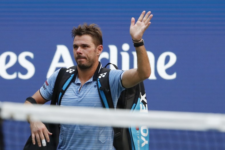 Sep 3, 2019; Flushing, NY, USA; Stan Wawrinka of Switzerland waves to the crowd while leaving the court after his match against Daniil Medvedev of Russia (not pictured) in a quarterfinal match on day nine of the 2019 US Open tennis tournament at USTA Billie Jean King National Tennis Center. Mandatory Credit: Geoff Burke-USA TODAY Sports