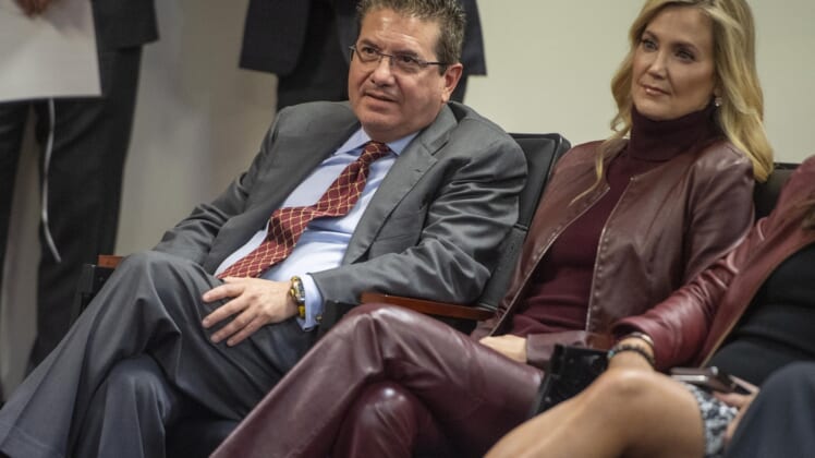 Jan 2, 2020; Ashburn, VA, USA; Washington Redskins owner Daniel Snyder and his wife Tanya look on as head coach Ron Rivera speaks during his introductory press conference at Inova Sports Performance Center. Mandatory Credit: Brad Mills-USA TODAY Sports