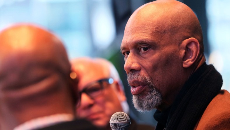 Kareem Abdul-Jabbar, right, talks with Grady Crosby, left, and Jim Paschke, center, at the "Diversity and Inclusion Conversation" at the MECCA Sports Bar and Grill.

MJS-bucksdiversity29p3