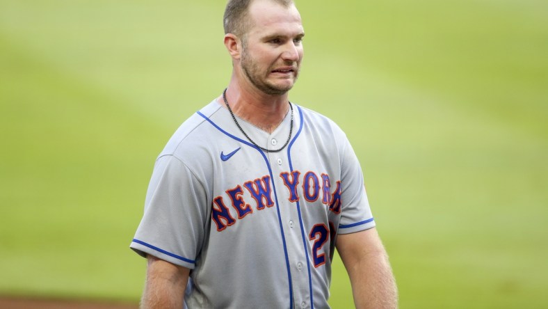 Aug 3, 2020; Atlanta, Georgia, USA; New York Mets first baseman Pete Alonso (20) reacts on the field against the Atlanta Braves in the third inning at Truist Park. Mandatory Credit: Brett Davis-USA TODAY Sports