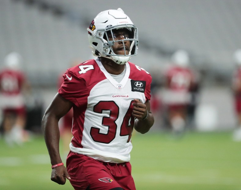 Arizona Cardinals defensive back Jalen Thompson warms up during practice at State Farm Stadium August 12, 2020. This was the first day of training camp.

Cardinals Training Camp