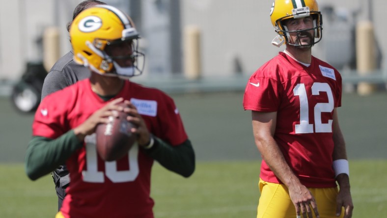 Green Bay Packers quarterback Aaron Rodgers (12) and quarterback Jordan Love (10) are shown Monday, August 17, 2020, during training camp in Green Bay, Wis.Apc Packerstrainingcamp 0817201049