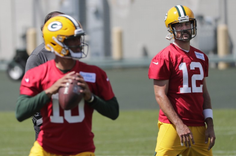 Green Bay Packers quarterback Aaron Rodgers (12) and quarterback Jordan Love (10) are shown Monday, August 17, 2020, during training camp in Green Bay, Wis.Apc Packerstrainingcamp 0817201049