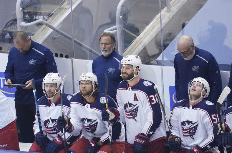 Aug 19, 2020; Toronto, Ontario, CAN; Columbus Blue Jackets head coach John Tortorella watches game action against the Tampa Bay Lightning during the second period in game five of the first round of the 2020 Stanley Cup Playoffs at Scotiabank Arena. Mandatory Credit: John E. Sokolowski-USA TODAY Sports