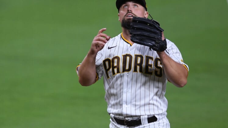 Sep 9, 2020; San Diego, California, USA; San Diego Padres relief pitcher Dan Altavilla (57) reacts after recording the last out of the top of the seventh inning against the Colorado Rockies at Petco Park. Mandatory Credit: Orlando Ramirez-USA TODAY Sports